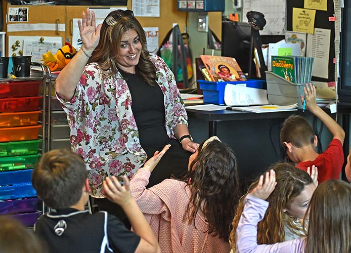 Teacher teaching students